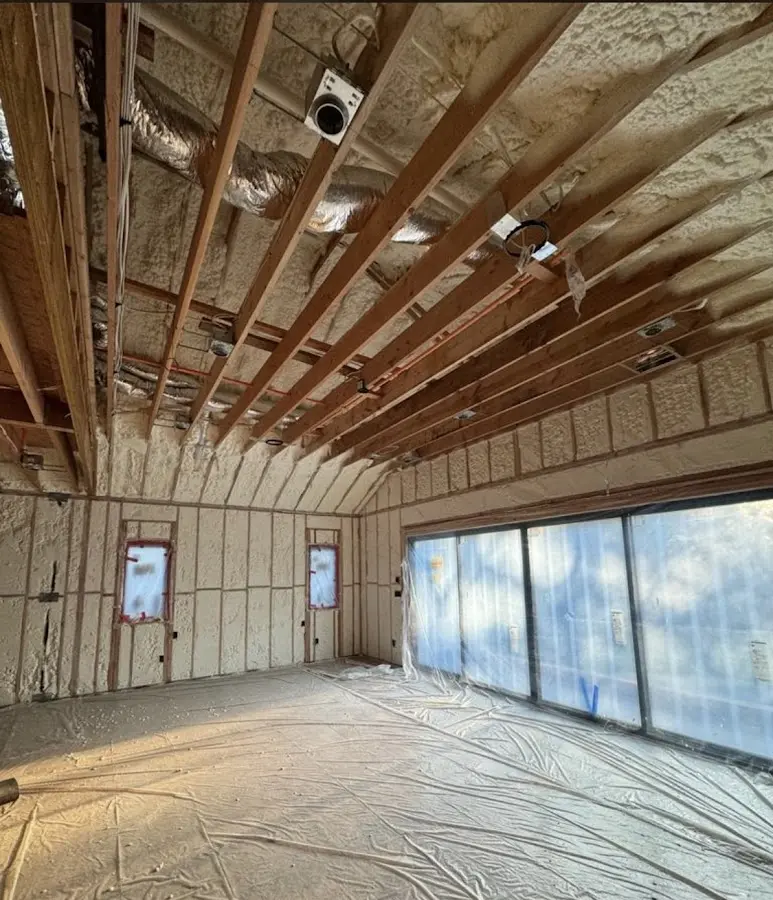 Interior walls and ceiling insulated with spray foam during new construction in Spotswood